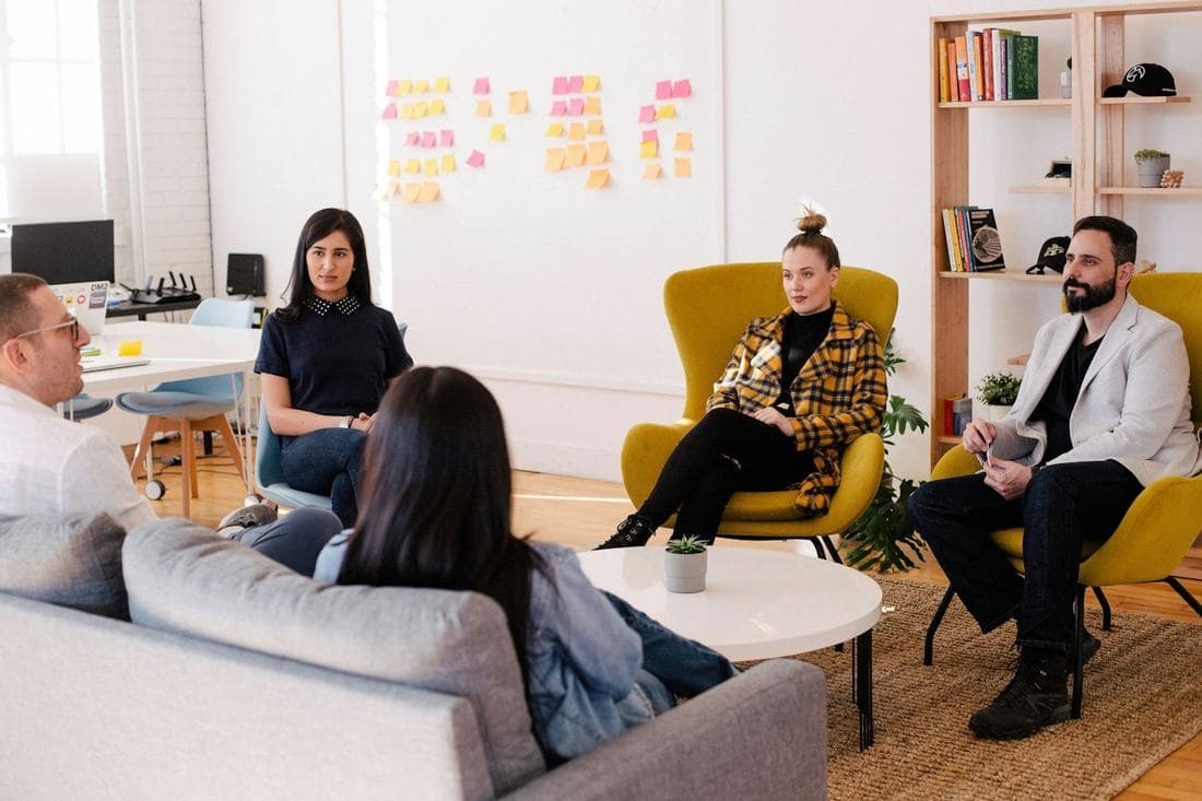 Team meeting in an office lounge